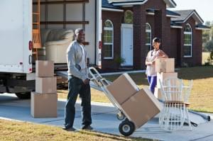 African American couple moving house