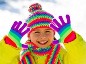 Winter fun, kid winter playing - lovely girl has a fun in snow